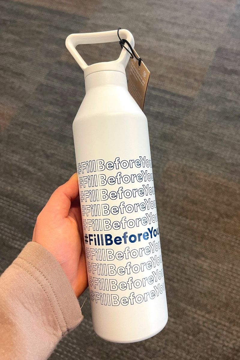 Reusable water bottle with the hashtag #FillBeforeYouFly